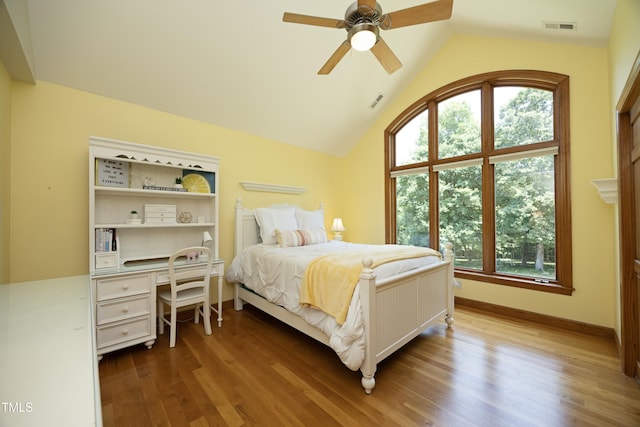 267 Bald Eagle Dr, Pittsboro, NC 27312 - bedroom with multiple windows, wood finished floors, lofted ceiling, and an office area