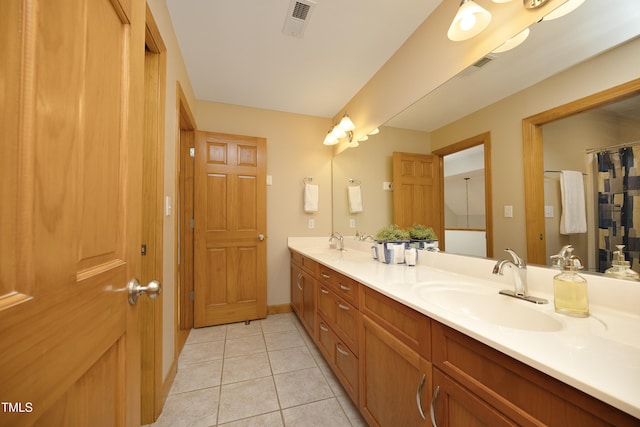 267 Bald Eagle Dr, Pittsboro, NC 27312 - bathroom with double vanity and tile patterned floors