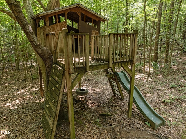 267 Bald Eagle Dr, Pittsboro, NC 27312 - view of jungle gym featuring a deck and a forest view
