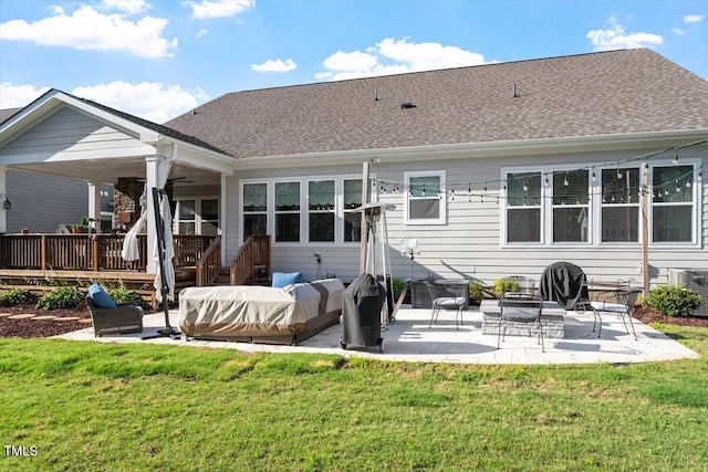 1217 Clandon Square Rd, Hillsborough, NC 27278 - back of house with a patio area, a lawn, a wooden deck, and a shingled roof