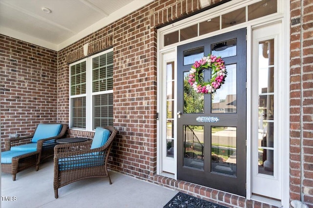 1217 Clandon Square Rd, Hillsborough, NC 27278 - doorway to property featuring brick siding and covered porch