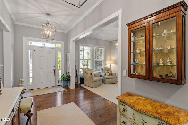 1217 Clandon Square Rd, Hillsborough, NC 27278 - foyer with dark wood finished floors, a chandelier, and crown molding