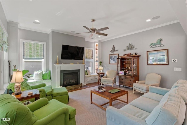 1217 Clandon Square Rd, Hillsborough, NC 27278 - living area featuring a ceiling fan, a fireplace with flush hearth, wood finished floors, recessed lighting, and crown molding