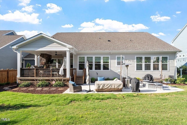 1217 Clandon Square Rd, Hillsborough, NC 27278 - back of property with a ceiling fan, a lawn, a patio, and an outdoor fire pit
