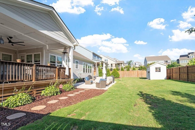 1217 Clandon Square Rd, Hillsborough, NC 27278 - fenced backyard featuring an outdoor living space, a residential view, a storage unit, a wooden deck, and ceiling fan