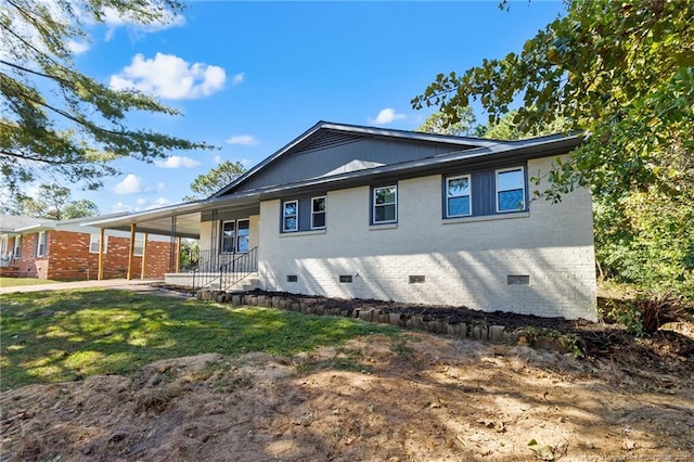 1718 Shiloh Dr, Fayetteville, NC 28304 - rear view of property featuring crawl space, covered porch, brick siding, and a yard