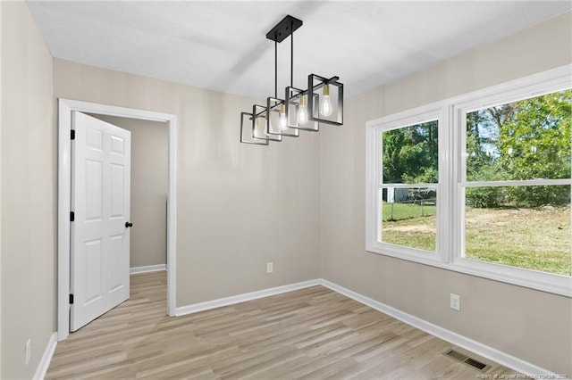 1718 Shiloh Dr, Fayetteville, NC 28304 - unfurnished dining area featuring light wood finished floors