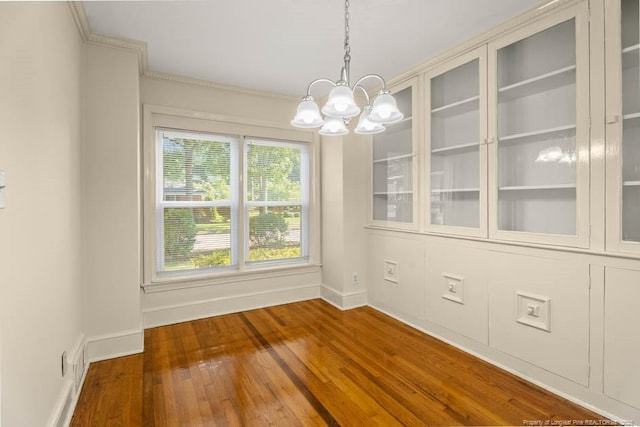 1905 N Rowland Ave N, Lumberton, NC 28358 - unfurnished dining area with a chandelier, hardwood / wood-style flooring, and crown molding