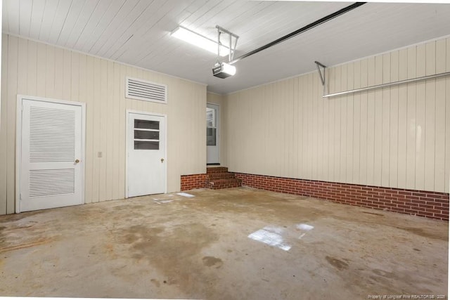 1905 N Rowland Ave N, Lumberton, NC 28358 - garage featuring a garage door opener