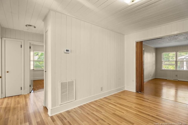 1905 N Rowland Ave N, Lumberton, NC 28358 - empty room with light wood finished floors and plenty of natural light
