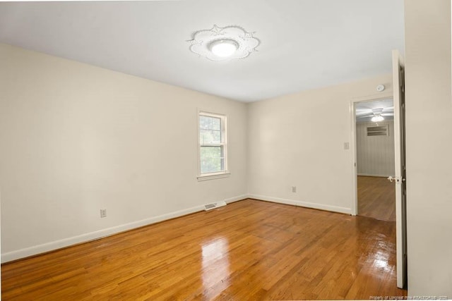 1905 N Rowland Ave N, Lumberton, NC 28358 - unfurnished room with wood finished floors and baseboards