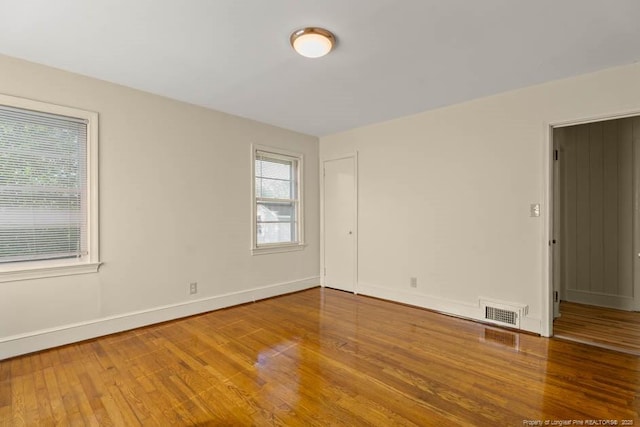 1905 N Rowland Ave N, Lumberton, NC 28358 - unfurnished room featuring wood finished floors and baseboards