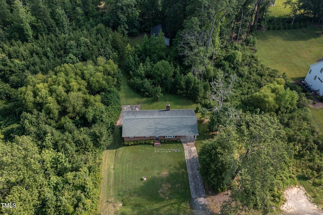 3603 Grimes Ave, Durham, NC 27703 - aerial view of property and surrounding area featuring a heavily wooded area