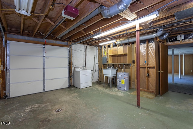 3603 Grimes Ave, Durham, NC 27703 - garage with washer / clothes dryer, water heater, and a garage door opener