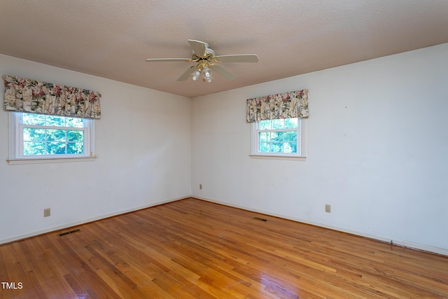 3603 Grimes Ave, Durham, NC 27703 - unfurnished room with light wood-type flooring and ceiling fan