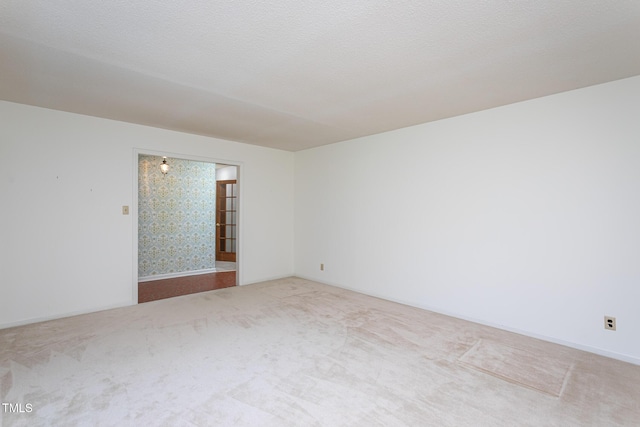 3603 Grimes Ave, Durham, NC 27703 - unfurnished room with carpet and baseboards