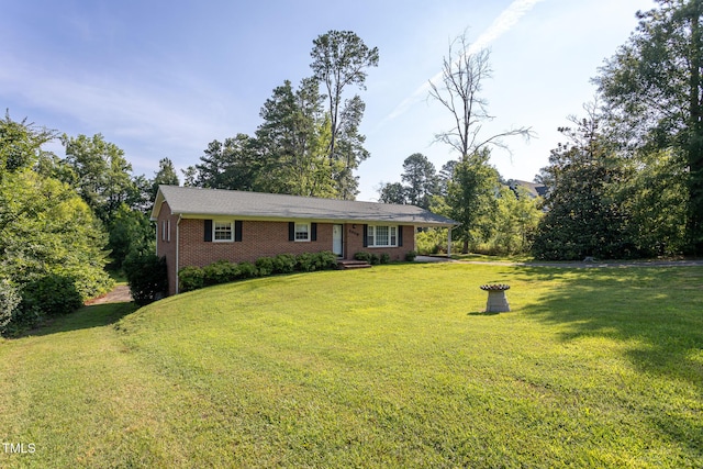 3603 Grimes Ave, Durham, NC 27703 - ranch-style house featuring a front lawn and brick siding