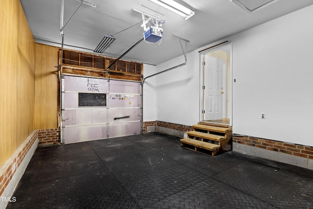 3421 Tunas St, Raleigh, NC 27616 - garage featuring a garage door opener