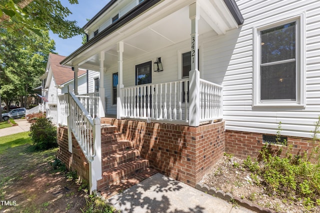 3421 Tunas St, Raleigh, NC 27616 - view of exterior entry with covered porch and crawl space