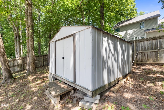 3421 Tunas St, Raleigh, NC 27616 - view of shed featuring a fenced backyard