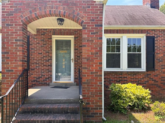 202 E 17th St, Lumberton, NC 28358 - entrance to property featuring brick siding and a chimney