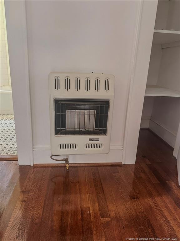 202 E 17th St, Lumberton, NC 28358 - detailed view of heating unit and wood finished floors