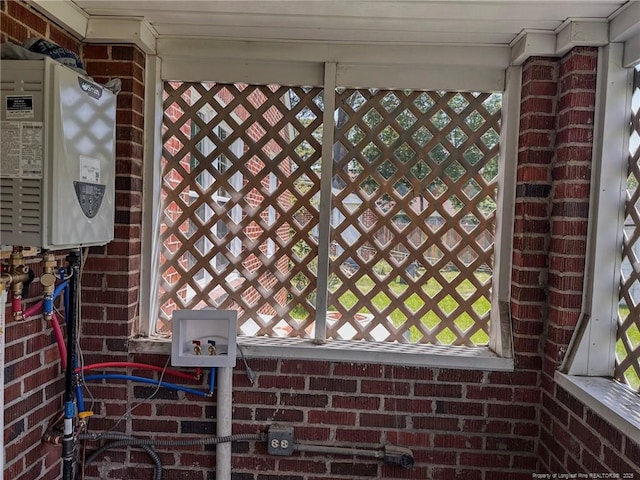 202 E 17th St, Lumberton, NC 28358 - detailed view of brick siding and water heater