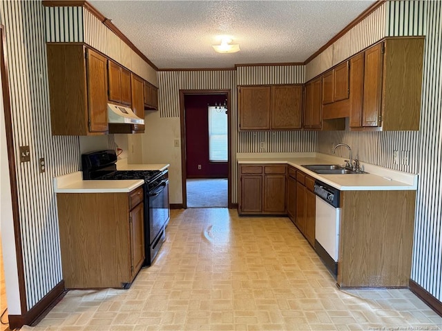 1886 Windlock Dr, Fayetteville, NC 28304 - kitchen with black gas stove, range hood, crown molding, wallpapered walls, and brick patterned flooring