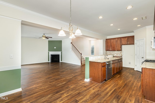 713 Summer Music Ln, Raleigh, NC 27603 - kitchen with appliances with stainless steel finishes, recessed lighting, decorative backsplash, ceiling fan, and crown molding