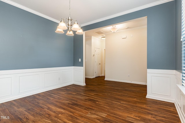 713 Summer Music Ln, Raleigh, NC 27603 - unfurnished room with ornamental molding, dark wood-style floors, a chandelier, wainscoting, and a decorative wall