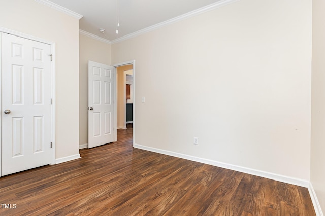 713 Summer Music Ln, Raleigh, NC 27603 - unfurnished bedroom with dark wood-style flooring and crown molding