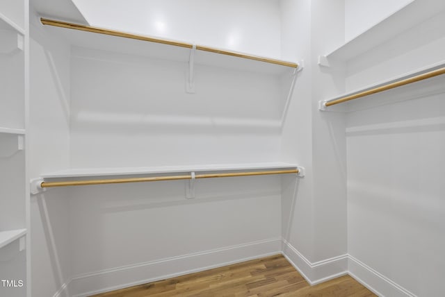 733 Daniel Ridge Rd, Wendell, NC 27591 - walk in closet featuring wood finished floors