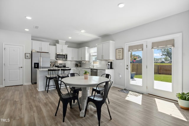 444 Campbell Ridge Pl, Wendell, NC 27591 - dining space with plenty of natural light, light wood-style flooring, and recessed lighting