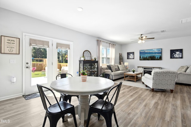 444 Campbell Ridge Pl, Wendell, NC 27591 - dining room with a ceiling fan and light wood-style floors