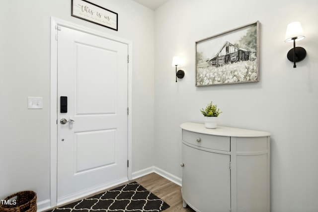 444 Campbell Ridge Pl, Wendell, NC 27591 - foyer featuring wood finished floors and baseboards