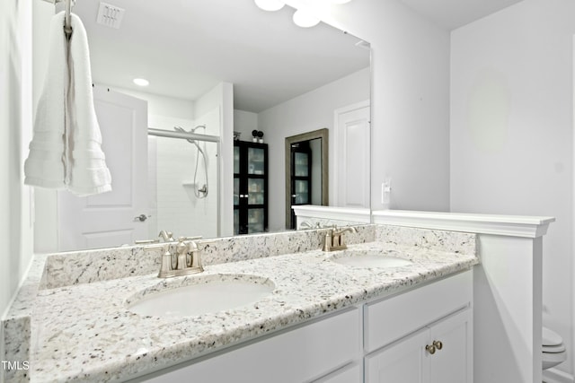 444 Campbell Ridge Pl, Wendell, NC 27591 - bathroom featuring double vanity and a stall shower