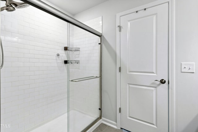 444 Campbell Ridge Pl, Wendell, NC 27591 - full bathroom with a shower stall and tile patterned flooring