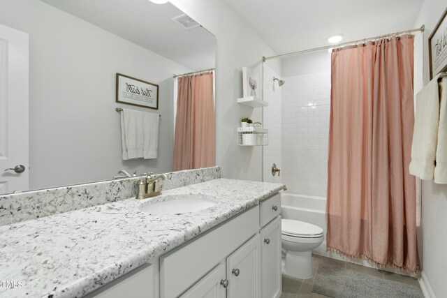 444 Campbell Ridge Pl, Wendell, NC 27591 - bathroom with vanity, shower / bath combo, and tile patterned flooring