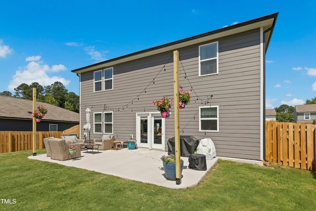 444 Campbell Ridge Pl, Wendell, NC 27591 - rear view of house with a fenced backyard, an outdoor hangout area, and a patio area