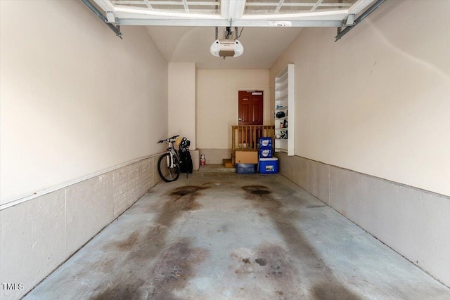 10511 Rosegate Ct Unit 103, Raleigh, NC 27617 - garage featuring a garage door opener
