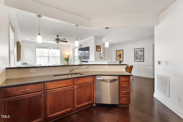 10511 Rosegate Ct Unit 103, Raleigh, NC 27617 - kitchen with dishwasher, decorative backsplash, hanging light fixtures, dark wood-style flooring, and ceiling fan