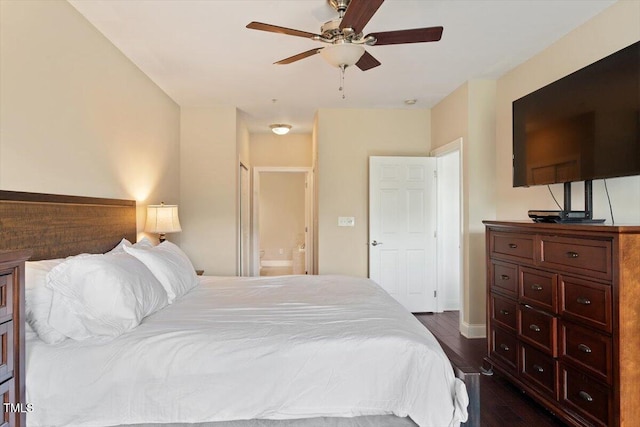 10511 Rosegate Ct Unit 103, Raleigh, NC 27617 - bedroom with dark wood finished floors, connected bathroom, and ceiling fan