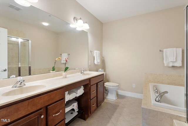 10511 Rosegate Ct Unit 103, Raleigh, NC 27617 - full bath featuring double vanity, a bath, tile patterned flooring, and a tile shower