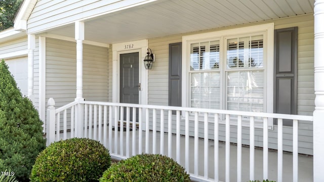 3782 Loblolly Dr # 5, Rocky Mount, NC 27804 - doorway to property featuring covered porch and a garage
