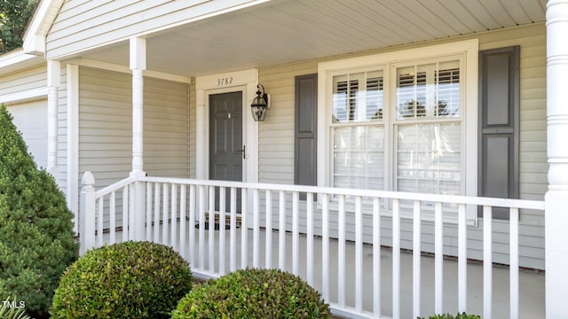 3782 Loblolly Dr # 5, Rocky Mount, NC 27804 - doorway to property with a porch and a garage