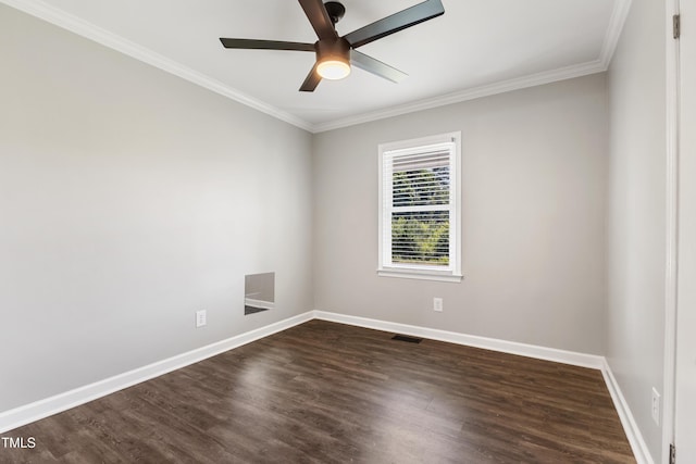 224 Grameta Ln, Lillington, NC 27546 - spare room featuring dark wood-type flooring, ornamental molding, and ceiling fan