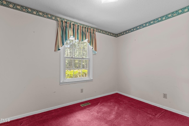 18 Red Pine Rd, Chapel Hill, NC 27516 - carpeted empty room featuring a textured ceiling and baseboards
