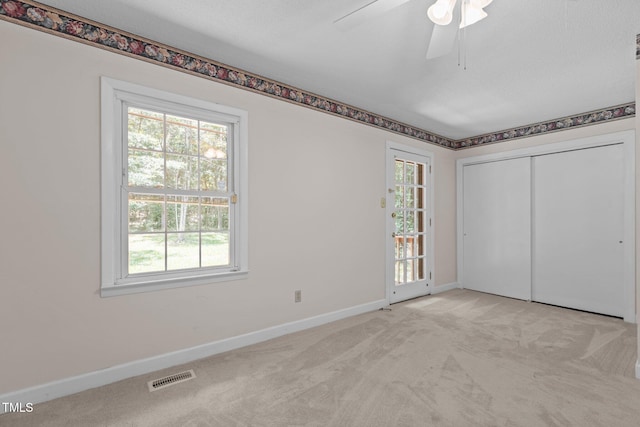18 Red Pine Rd, Chapel Hill, NC 27516 - unfurnished bedroom featuring carpet, ceiling fan, and a closet