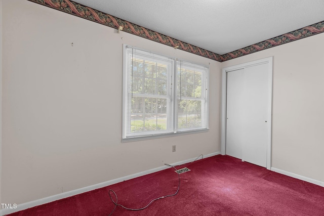 18 Red Pine Rd, Chapel Hill, NC 27516 - empty room with carpet and a textured ceiling