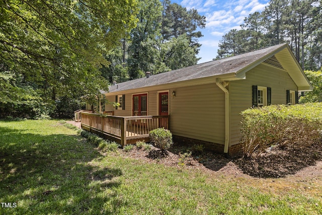 18 Red Pine Rd, Chapel Hill, NC 27516 - back of property with a wooden deck and a lawn
